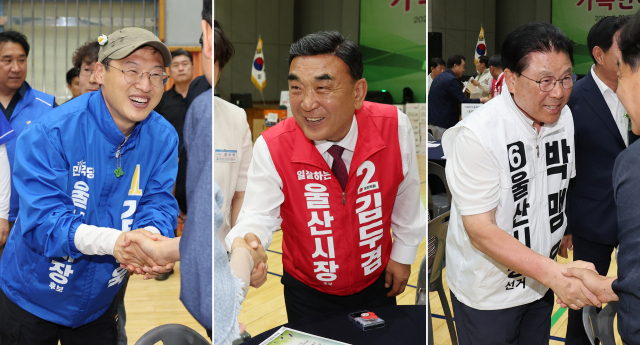 6·3 지방선거 울산시장 후보들이 31일 울산시 중구 울산고등학교에서 열린 총동창회 행사에 각각 참석해 시민과 인사하고 있다. 왼쪽부터 더불어민주당 김상욱, 국민의힘 김두겸, 무소속 박맹우 후보. 연합뉴스